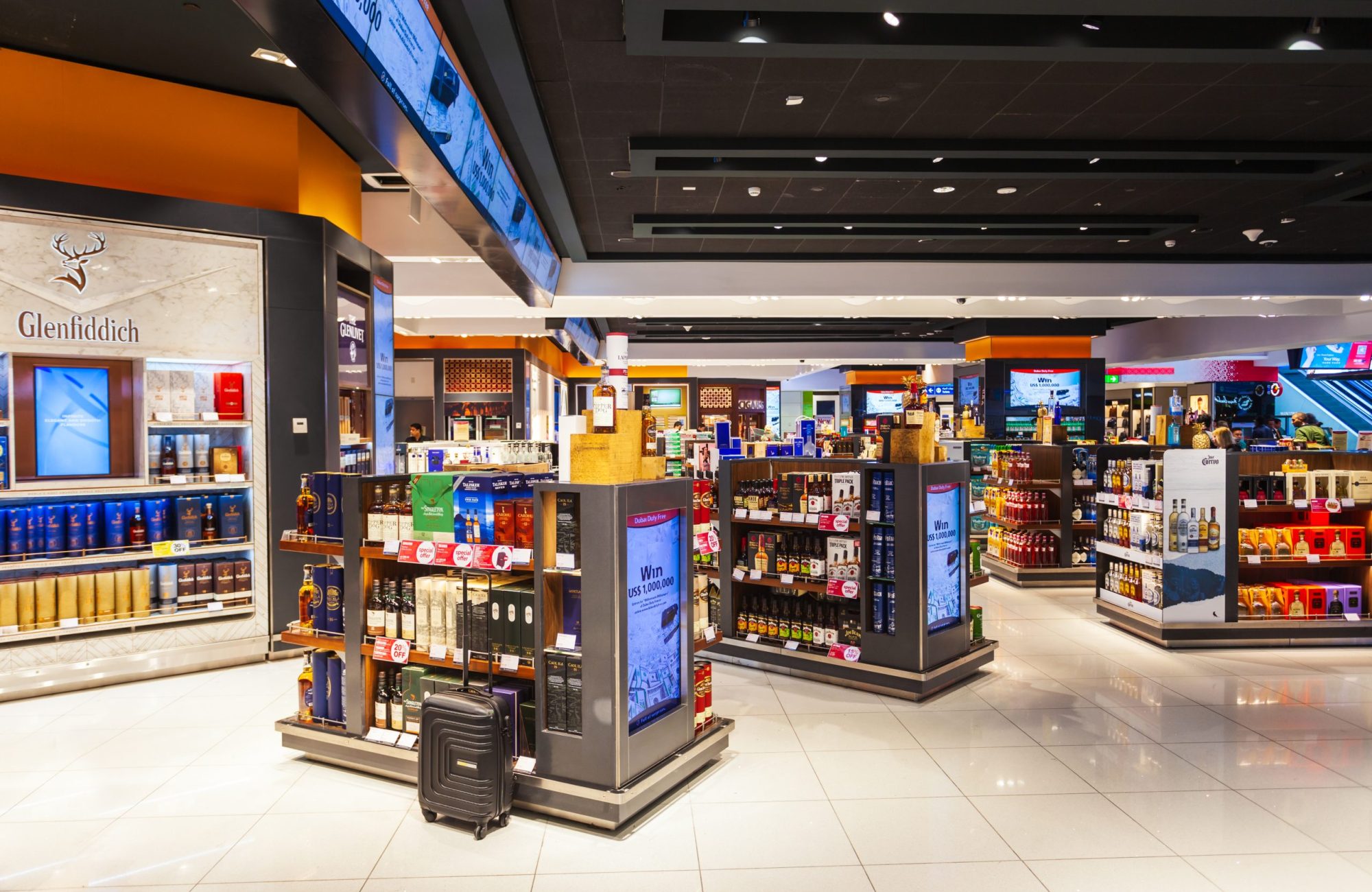 DUBAI, UAE - MARCH 02, 2019: Alcohol shop in the duty free zone in the Dubai International Airport in UAE
